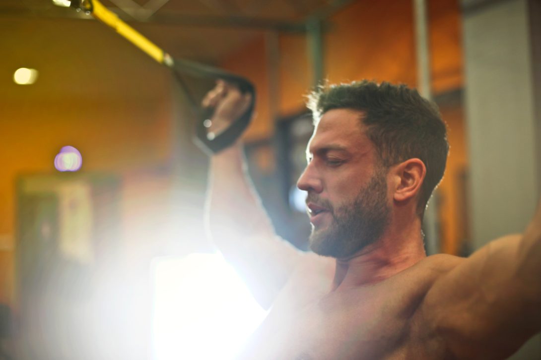 A man exercising on the gym