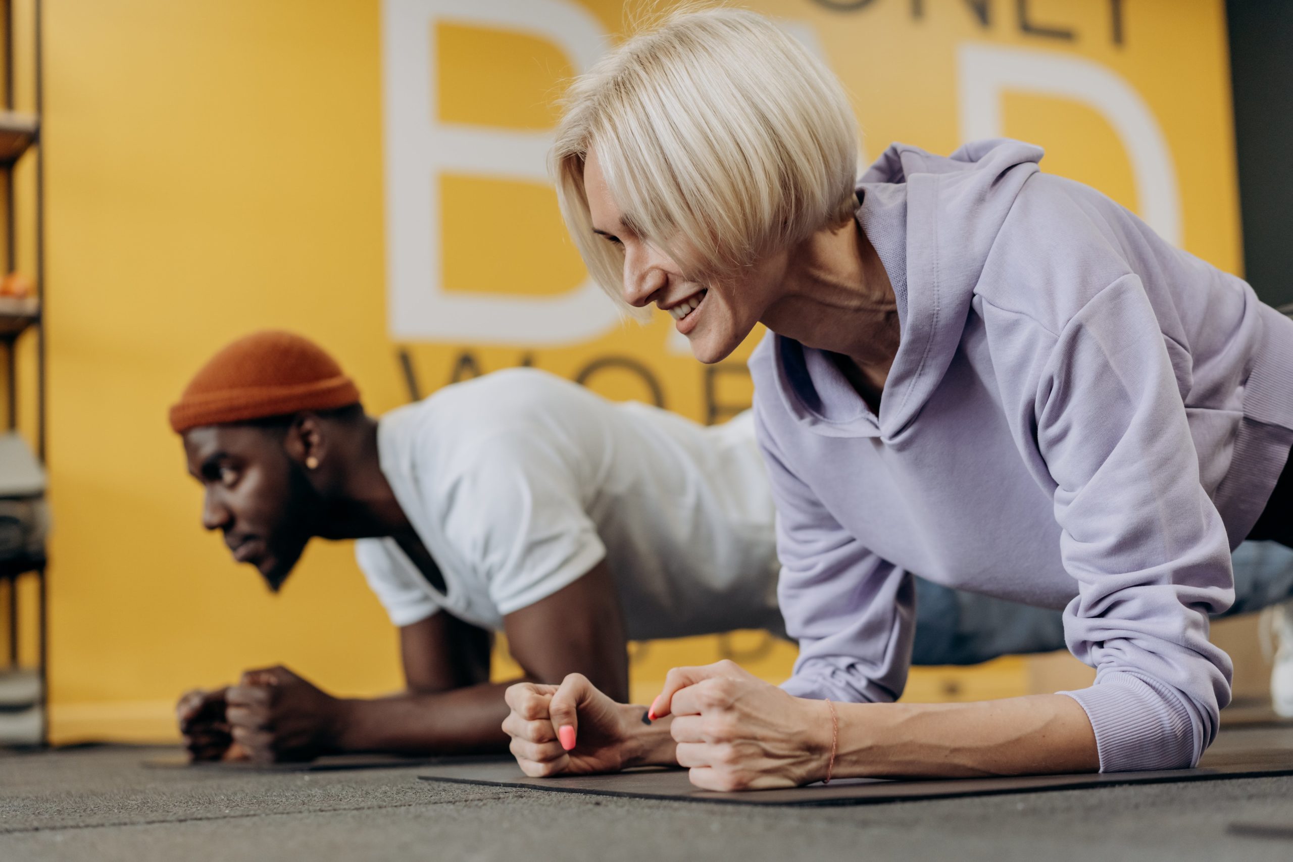 A man and woman doing resistance exercise together