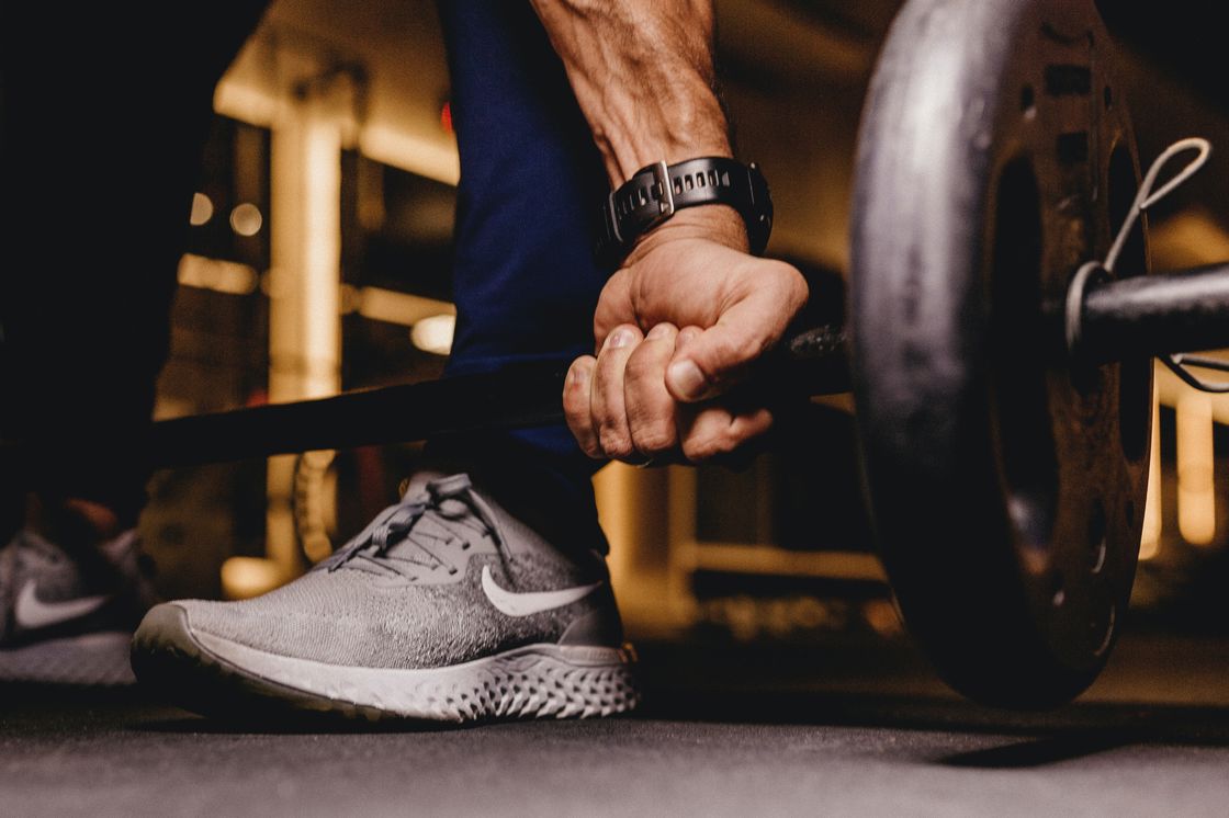 Man about to lift a barbell