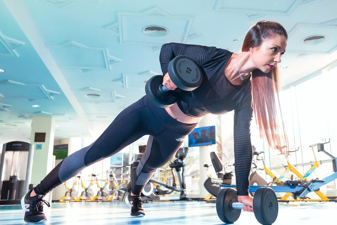 Woman lifting weights from the floor