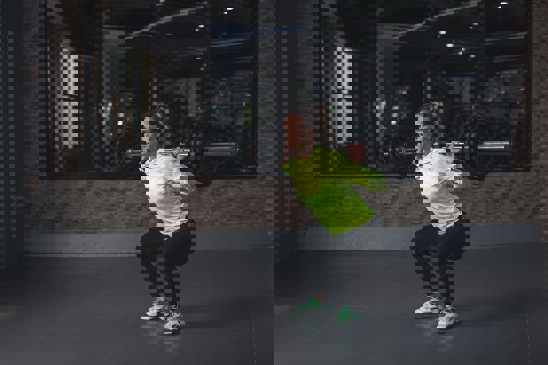 Woman lifting a barbell