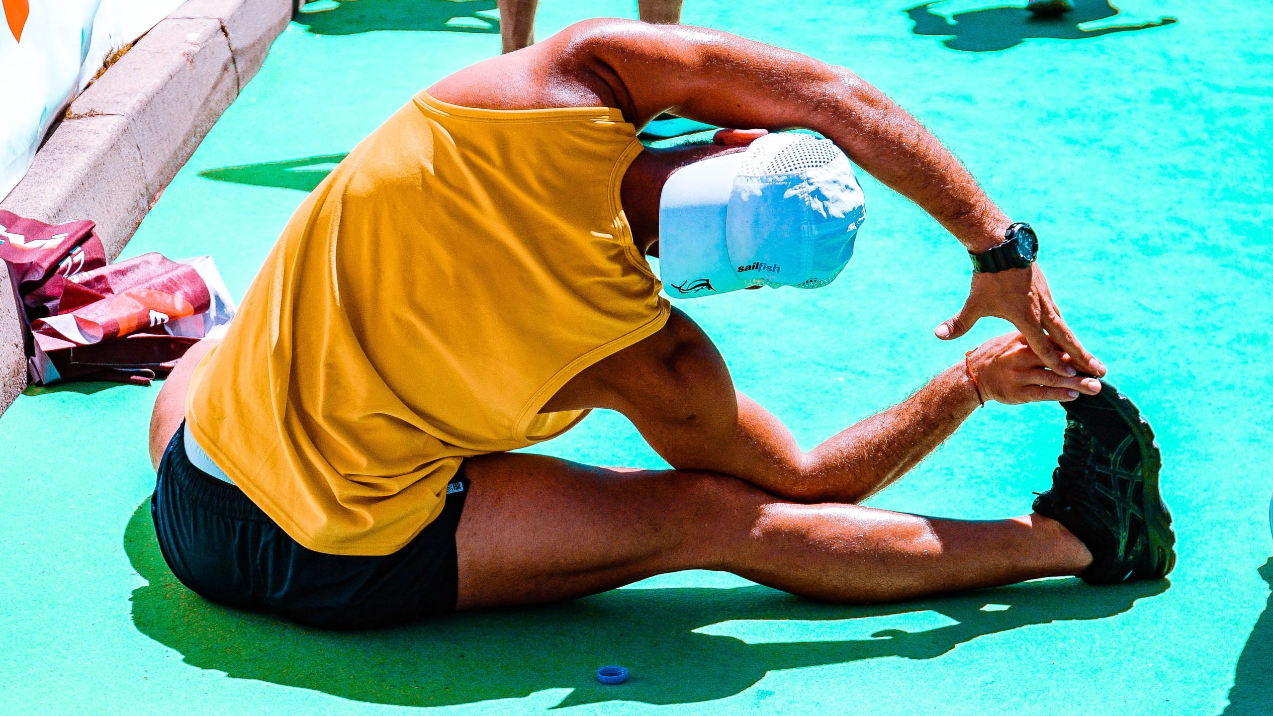 A man stretching outside