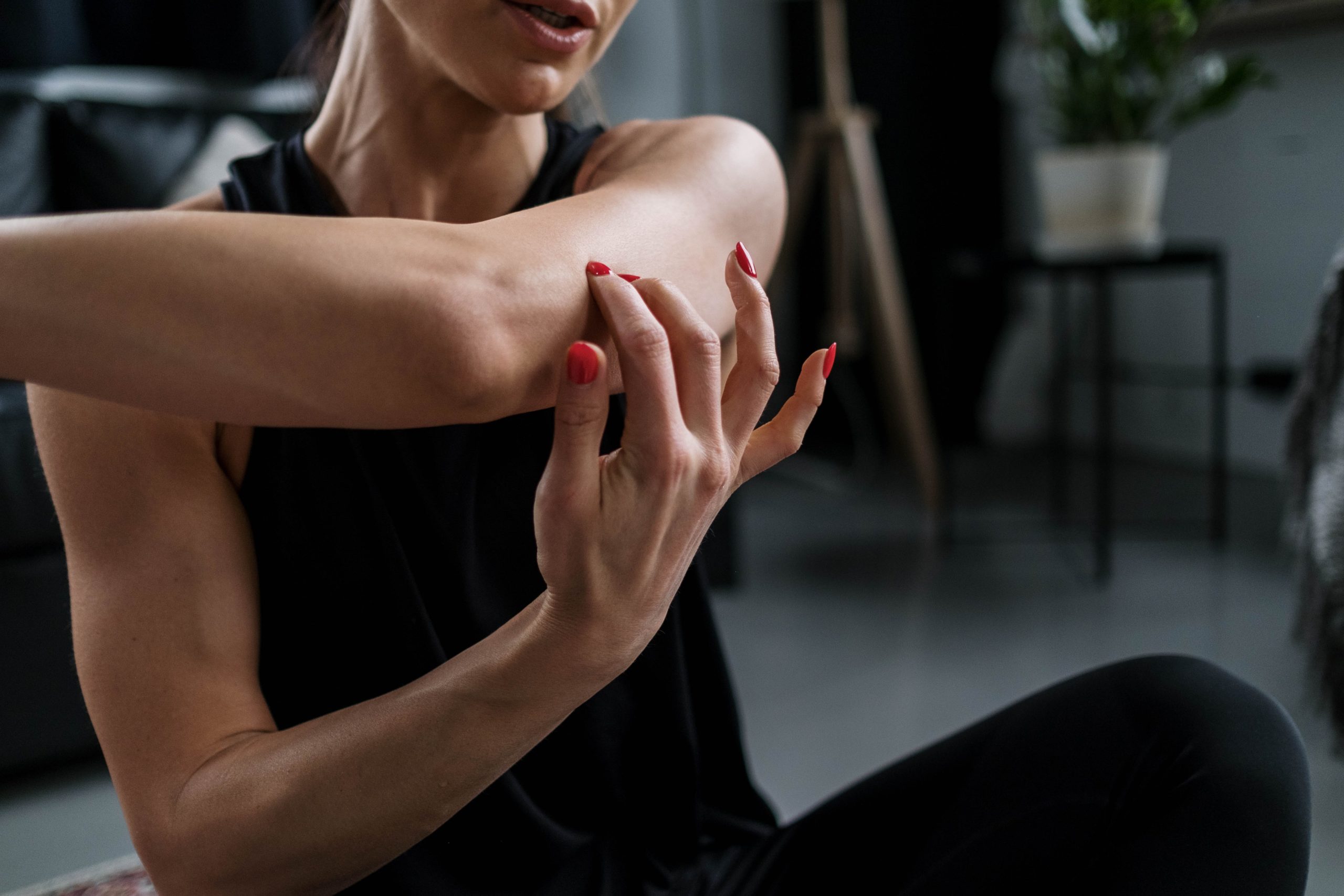 A woman stretching her arms