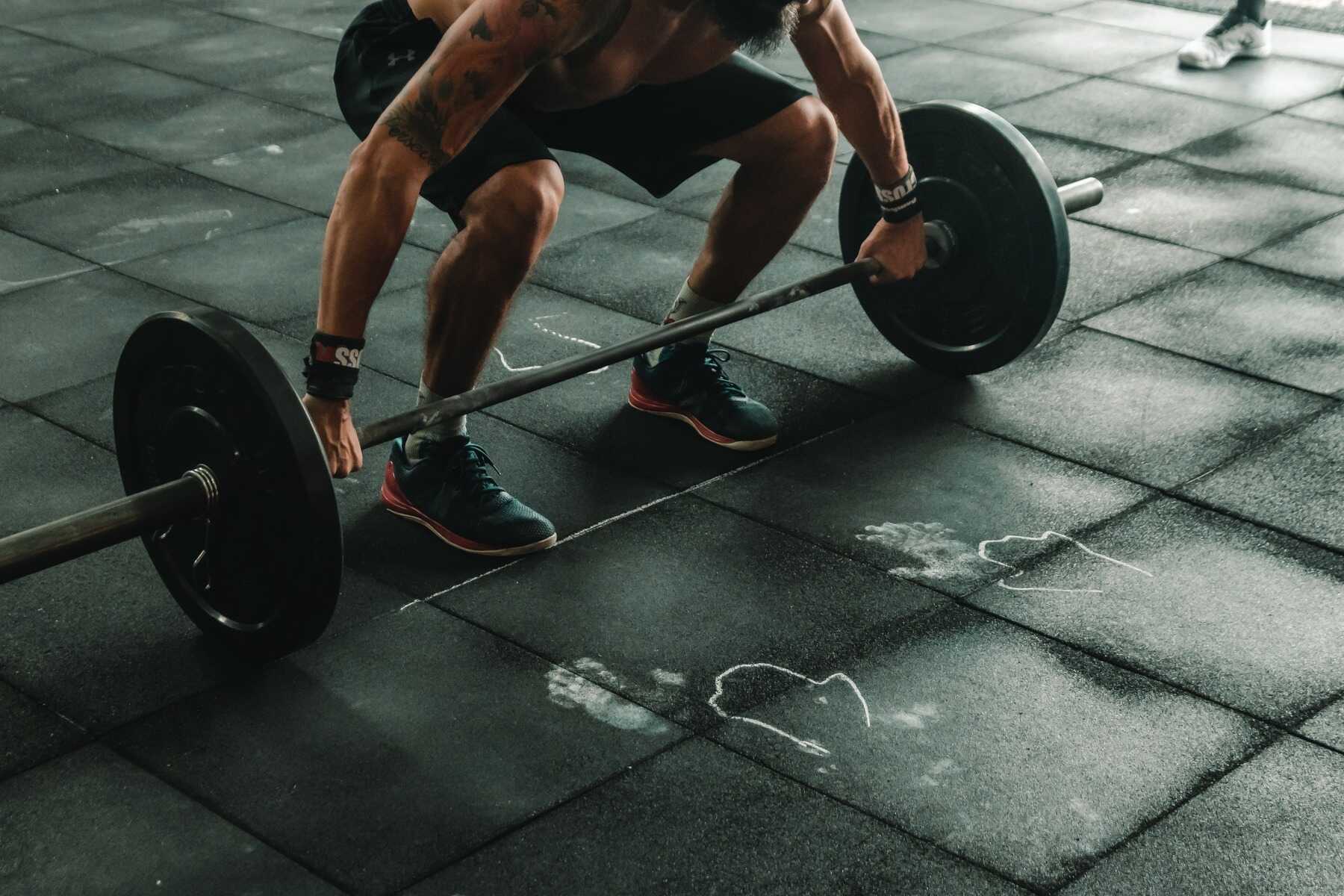 Man getting ready to do clean and jerk workout