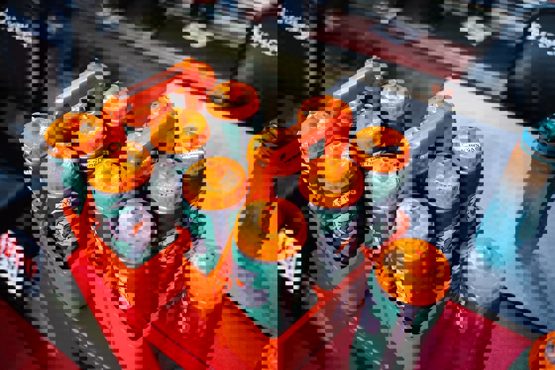 Green bottles of Gatorade stored in a carrier